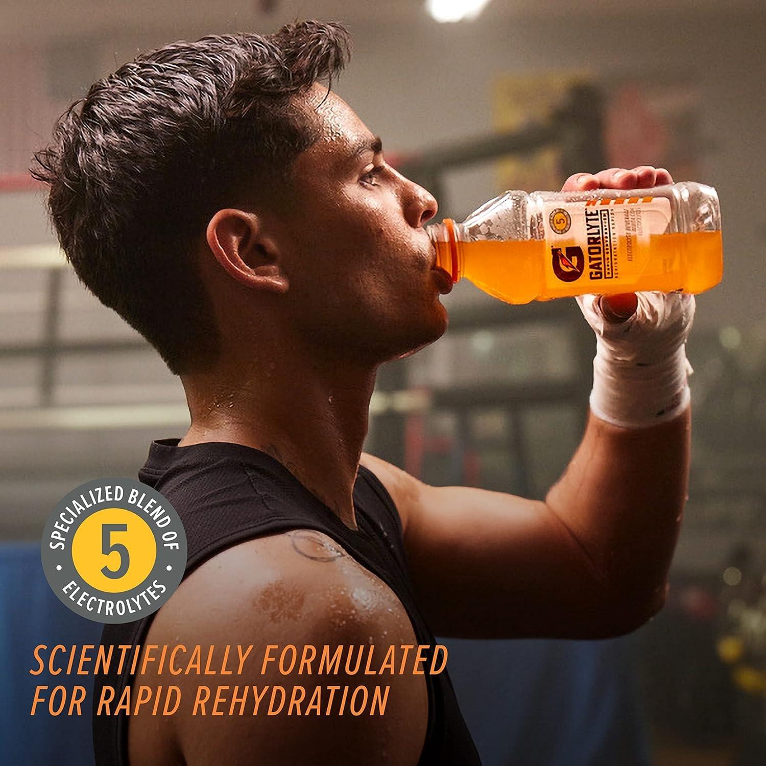 imageGatorlyte Rapid Rehydration Electrolyte Drink Strawberry Kiwi Specialized Blend of 5 Electrolytes Lower Sugar No Artificial Sweeteners No Artificial Flavors 20 fl oz Bottles 12 PackPineapple Mango